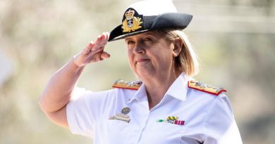 Newly appointed Commander Joint Health and Surgeon General of the Australian Defence Force Rear Admiral Sarah Sharkey salutes during a parade at Campbell Park Offices, Canberra. Photo by Jay Cronan.