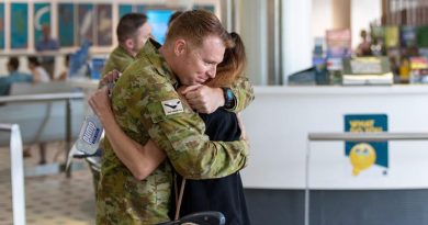 A member of TG Taji 9 is welcomed home to Brisbane after his deployment to Afghanistan. ADF photo.