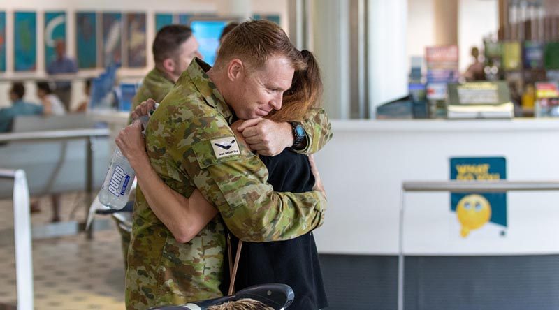 A member of TG Taji 9 is welcomed home to Brisbane after his deployment to Afghanistan. ADF photo.
