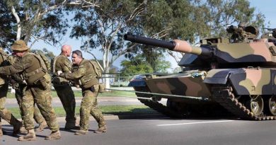 Soldiers of 2nd Cavalry Regiment in Townsville pull a 62-tonne Abrams tank – for PT.