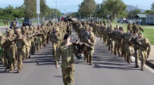 Soldiers of 2nd Cavalry Regiment in Townsville pull a 62-tonne Abrams tank for PT.