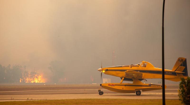 A graphic evidence of how close the bushfires came to HMAS Albatross on New Year's Day, even as military and civilian aircraft continued bushfire-support operations from the base.