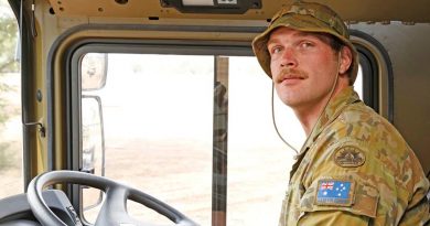 Australian Army soldier Private Jonathan Amey from the Brisbane-based 5 Transport Squadron, 7th Combat Services Support Battalion, in his HX77 heavy vehicle taking part in Operation Bushfire Assist. Photo by Sergeant Dave Morley.