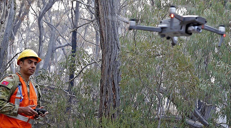 Australian Army Reserve soldier Lance Bombardier Daniel Stoian of 9 Regiment, Royal Australian Artillery, uses a drone to assist with locating koalas near Cooma, NSW. Photo by Sergeant Dave Morley.