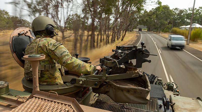 Corporal Michael Russ from the 1st Armoured Regiment moves in a convoy of ASLAVs tasked to support South Australia Water on Kangaroo Island. Photo by Corporal Tristan Kennedy.