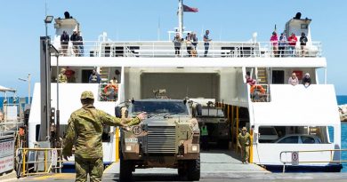 Reservists from the 10th/27th Battalion, Royal South Australia Regiment, load vehicles onto the Kangaroo Island ferry at Cape Jervis, South Australia, during Op Bushfire Assist. Photo by Corporal Tristan Kennedy.
