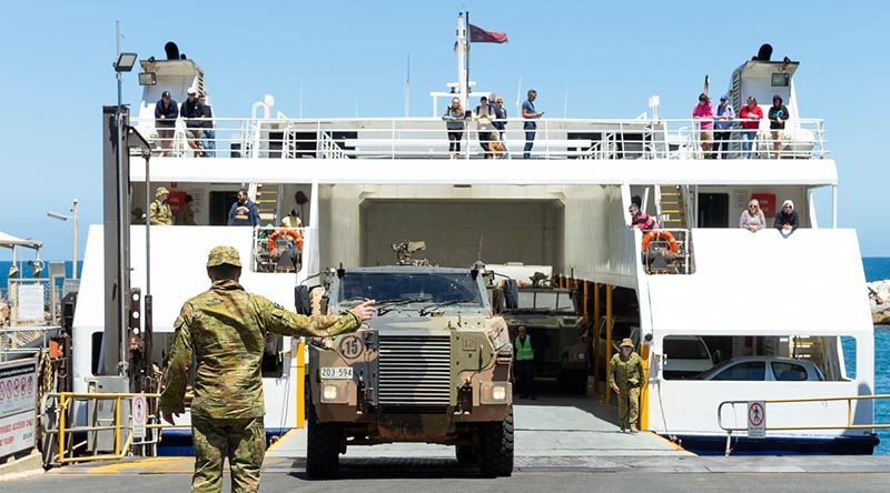 Reservists from the 10th/27th Battalion, Royal South Australia Regiment, load vehicles onto the Kangaroo Island ferry at Cape Jervis, South Australia, during Op Bushfire Assist. Photo by Corporal Tristan Kennedy.