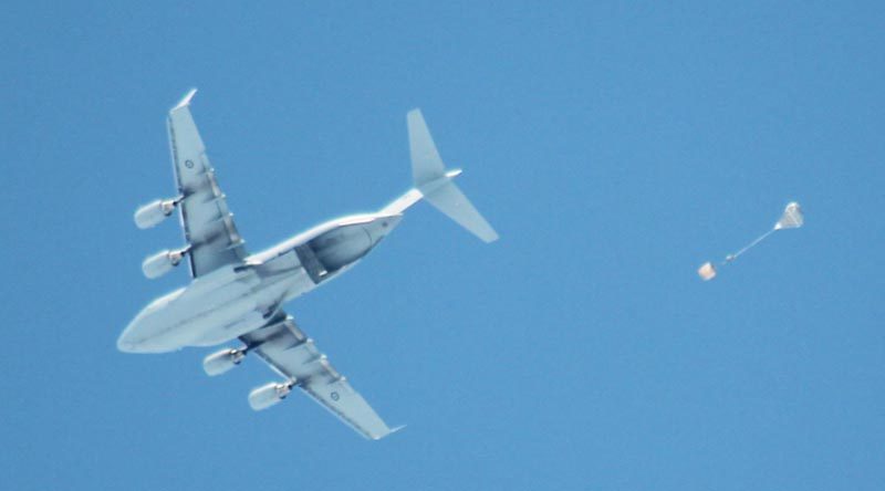 A Royal Australian Air Force C-17A Globemaster airdrops a Joint Precision Aerial Delivery System (JPADS) load near Casey Station in Antarctica for Operation Southern Discovery.