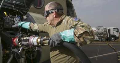 Sergeant Ian MacGregor refuels a Chinook helicopter at at RAAF Base East Sale in preparation for a mission during Operation Bushfire Assist. Photo by Corporal Kylie Gibson.