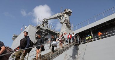 Evacuees from Mallacoota, Victoric, disembark HMAS Choules at Western Port. Photo by Petty Officer Nina Fogliani.