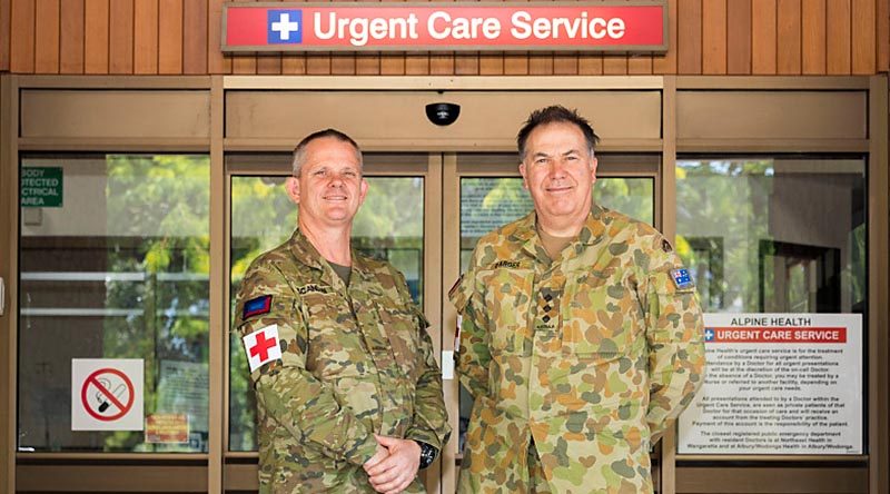 4th Combat Service Support Battalion Paramedic Private Rod Scanlon and Nursing Officer Captain Phil Barber at the Alpine Health Centre in Bright, where they took charge of community care in the absence of evacuated nurses. Photo by Corporal Sebastian Beurich.