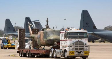 Retired UH-1H Iroquois helicopter A2-776 is trucked onto RAAF Base Richmond for storage en-route to its final destination in a RAAF heritage collection. Photo by Corporal David Said.