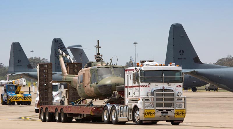 Retired UH-1H Iroquois helicopter A2-776 is trucked onto RAAF Base Richmond for storage en-route to its final destination in a RAAF heritage collection. Photo by Corporal David Said.