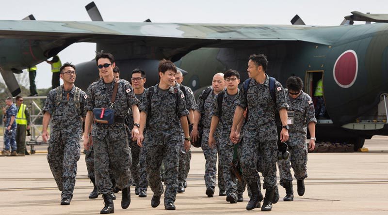 Japan Self-Defense Force personnel walk from their C-130H Hercules after arriving at RAAF Base Richmond to assist in Operation Bushfire Assist. Photo by David Said.