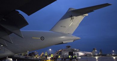 A Royal New Zealand Air Force NH-90 is unloaded off a Royal Australian Air Force C-17A Globemaster III aircraft at RAAF Base Richmond during Operation Bushfire Assist 19-20. Photo by Corporal Nicci Freeman.