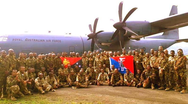 Kumul Force 17 personnel pose for a photo before embarking a RAAF C130 for Port Moresby to marry up with 18 Assault Pioneers from 1RPIR, and other elements from HQPNGDF, before being airlifted by two RAAF C130s to Melbourne, for the Operation Halivim Wantok. PNGDF photo.