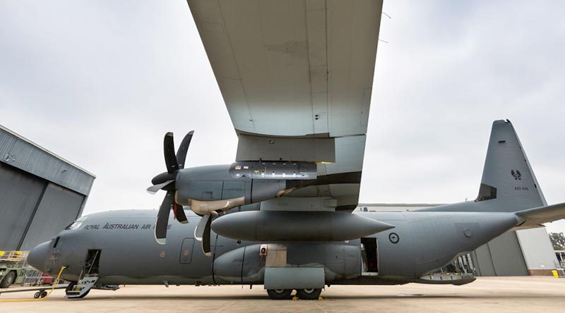 A Litening sensor pod hangs from the wing of a No. 37 Squadron C-130J Hercules aircraft at RAAF Base Richmond. Photo by Corporal David Said.