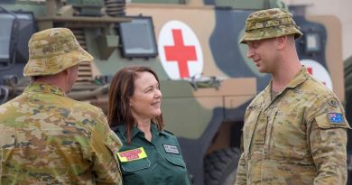 St John Ambulance Registered Nurse Diana Wong chats with Australian Army medic Private Brenden Walker from the 1st Combat Health Battalion at Batemans Bay. Photo by Sergeant Bill Solomou.