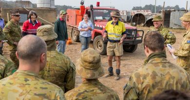 NSW Rural Fire Service Deputy Captain Bobby Boate briefs members of the Australian Army Reserve before their next support task in Jerangle, NSW. Photo by Lance Corporal Brodie Cross.
