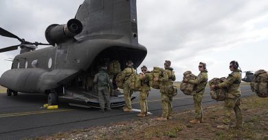 ADF medical personnel board a Singaporean Chinook at RAAF Base East Sale for a ferry flight to Mallacoota. Singapore Armed Forces photo.