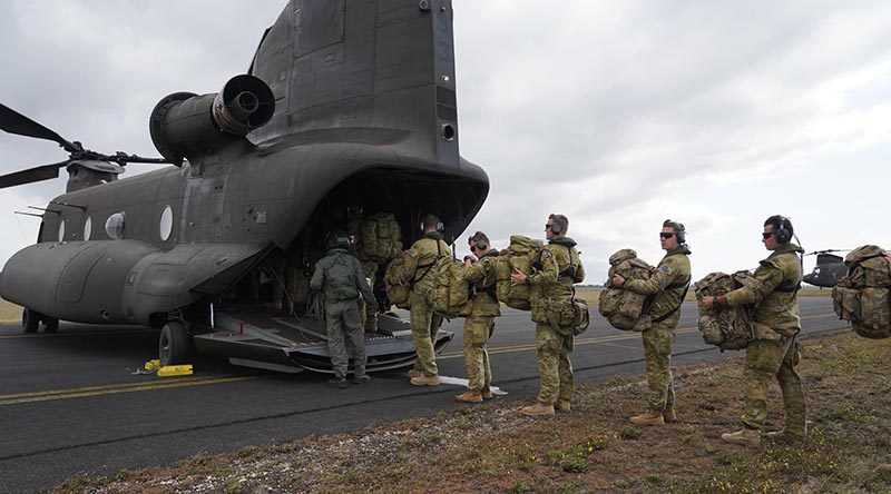 ADF medical personnel board a Singaporean Chinook at RAAF Base East Sale for a ferry flight to Mallacoota. Singapore Armed Forces photo.