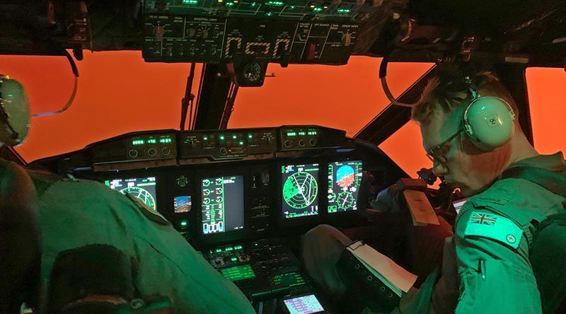 Royal Australian Air Force C-27J Spartan pilots from No. 35 Squadron work in arduous conditions as they approach Mallacoota, Victoria, on a bushfire-evacuation sortie. Photo by Flight Lieutenant Luke Georgeson.