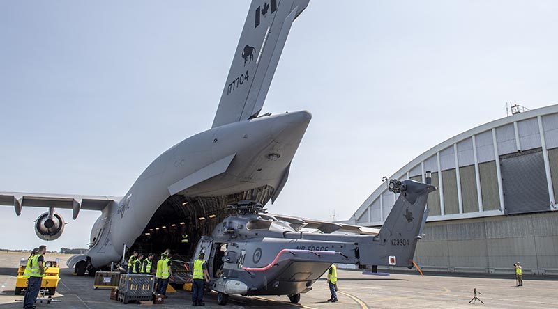 The first of three NH90s is returned to RNZAF Ohakea via RCAF CC-177 Globemaster. NZDF photo.