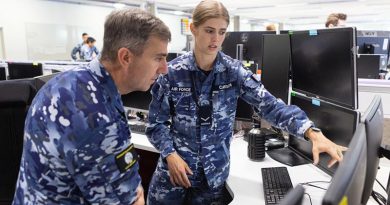 Air Commander Australia Air Vice Marshal Joe Iervasi is briefed by Leading Aircraftwoman Tori-Lee Carson at Distributed Ground Station - Australia during a visit to RAAF Base Edinburgh to meet with units and personnel supporting Operation Bushfire Assist. Photo by Leading Aircraftwoman Jacqueline Forrester.