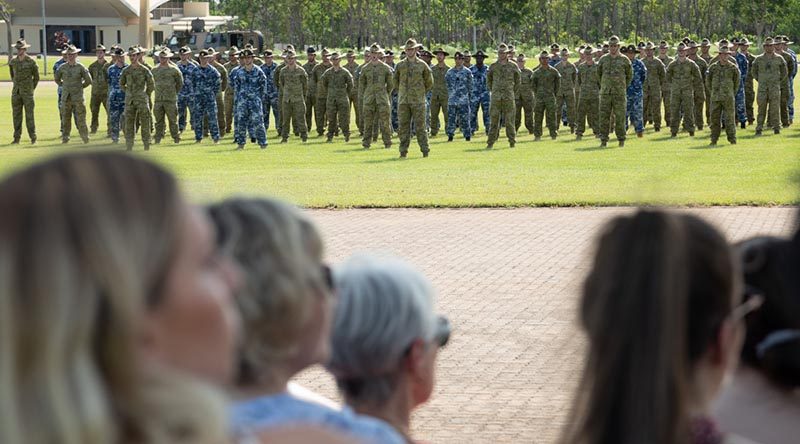 Friends and family watch a parade for deploying ADF personnel at Robertson Barracks, Darwin, NT. Photo by Petty Officer Peter Thompson.