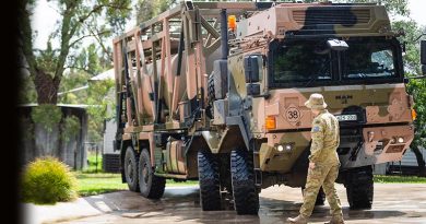 Australian Army soldier Lance Corporal Lewis James from the 3rd Combat Engineer Regiment, guides Corporal Steven Wilson from the 3rd Combat Service Support Battalion driving a MAN HX77 water resupply module vehicle in support of Operation Bushfire Assist 19-20. Photo by Private Madhur Chitnis.