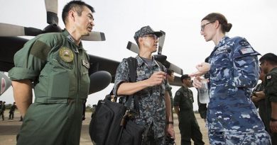 Flight Lieutenant Rebecca Marshall speaks with Japan Self-Defense Force personnel at RAAF Base Richmond. Photo by Corporal David Said.