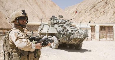 A New Zealand soldier and NZLAV on patrol in north-east Bamyian province, Afghanistan. NZDF photo.