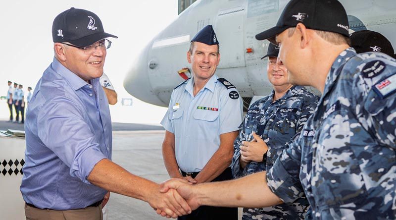 Prime Minister Scott Morrison meets with Royal Australian Air Force personnel during a visit to RAAF Base Tindal, where he announced a new $1billion upgrade. Photo by Corporal Jessica de Rouw.