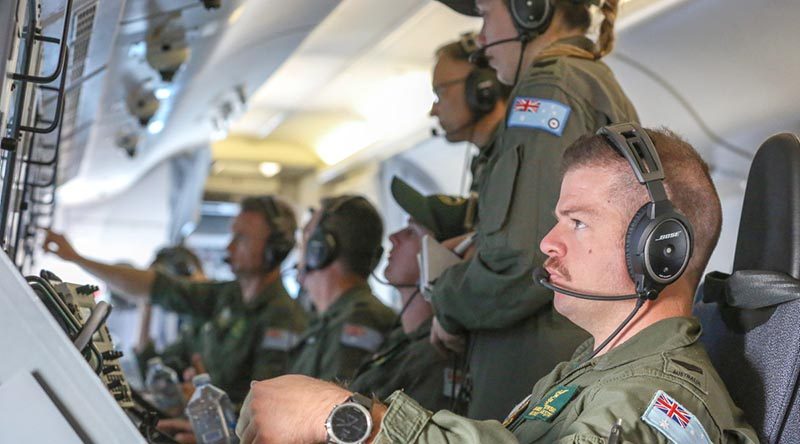 Members from No. 11 Squadron carry out a mission on a P-8A Poseidon during Operation Bushfire Assist 19-20. The mission flew over 10 hours and included surveillance of the Victorian alpine region, country New South Wales and Kangaroo Island in South Australia. Photo by Corporal Brenton Kwaterski.