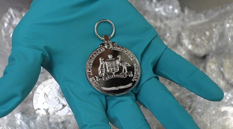 The front of a replica Australian Defence Medal – one of thousands confiscated when they were imported with a permit to use the Commonwealth Coat of Arms. ABF photo.