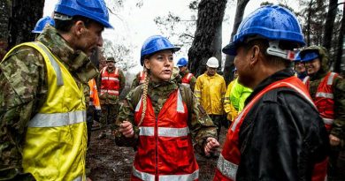 Lieutenant Colonel Renee Kidson updates Major General Justin Ellwood, left, and TNI Lieutenant Colonel Teddi on the work being conducted by troops at the Zig Zag Railway. Photo by Flight Sergeant Ricky Fuller.