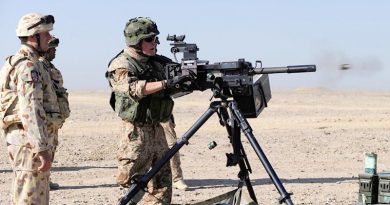 Warrant Officer Class 2 Brett Donaldson, ‘A’ Field Battery, supervises a Danish soldier firing a Heckler and Koch grenade machine gun during a range practice at Forward Operating Base Budwan, Helmand Province Afghanistan. Photo by Corporal Raymond Vance.