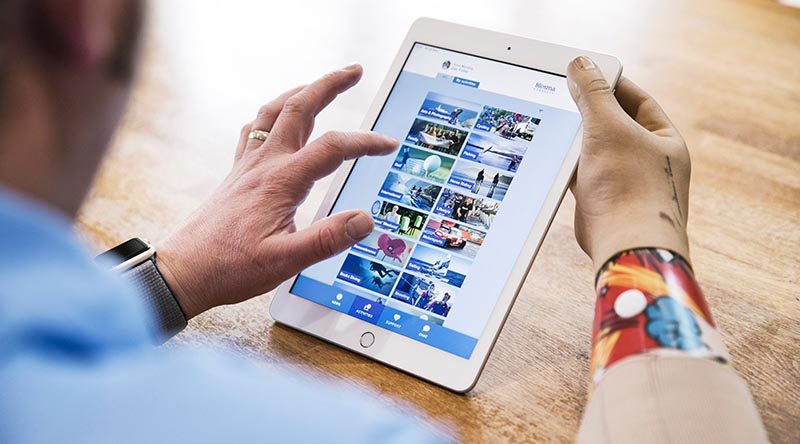 A wounded ex-serviceman views the Blesma Connects app on his tablet. Image supplied.