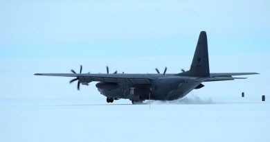 An RAAF C-130J Hercules lands at Wilkins Runway, Antarctica. Photo by Christopher Burns, Australian Antarctic Division.