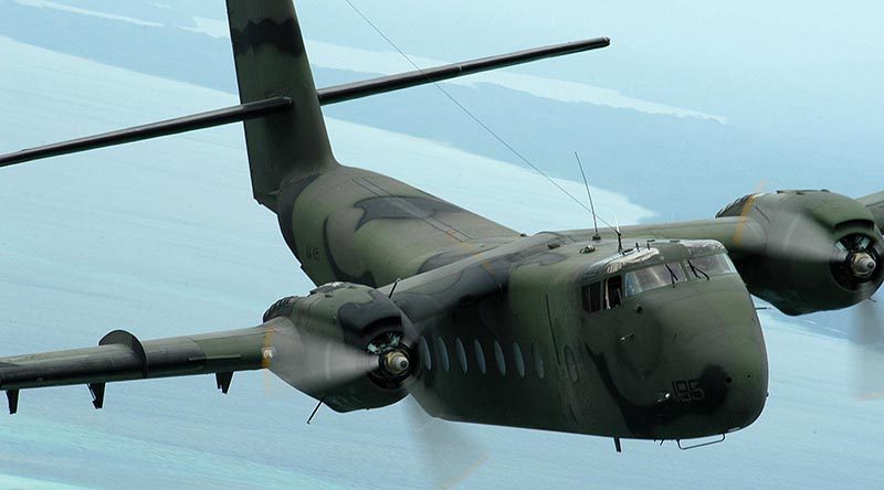 RAAF Caribou A4-195 on a RAMSI mission over the Solomon Islands, September 2003. Photo by Brian Hartigan.