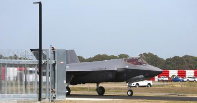 A35-009 taxis through a fence at its home compound at RAAF Base Williamtown for the first time on 10 December 2018. Photo by Brian Hartigan.