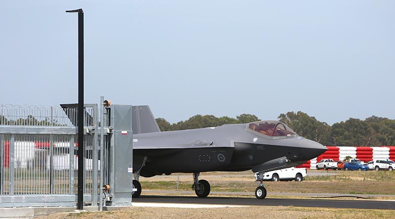 A35-009 taxis through a fence at its home compound at RAAF Base Williamtown for the first time on 10 December 2018. Photo by Brian Hartigan.