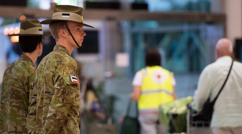 Australian Army reservist Private Connor Styles from the 9th Battalion, Royal Queensland Regiment, supporting the mandatory COVID-19 quarantine arrangements for international travellers at Brisbane Airport, Queensland. Photo by Trooper Jonathan Goedhart.