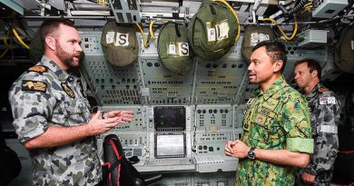 The Sultan of Brunei talks to HMAS Dechaineux's CO Commander Bradley Francis, with Chief of Navy Vice Admiral Mick Noonan in the background. Photo courtesy of Brunei's Information Department.