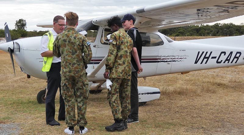 CDT Gladwin Shekarr, CDT Billy Morgan and LCDT Bradley Gallimore from 708 Squadron receive a pre-flight brief from RACWA pilot instructor Mark Dawson before their flight in a Cessna 172R Skyhawk. Cadet Morgan later said, “There really was no way to get bored on that flight”. Photo supplied by PLTOFF(AAFC) Alex Hartner.