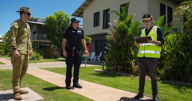 Australian Army soldier Lance Bombardier Jacob Homulos, Northern Territory Police Officer Senior Constable Maxwell Lisson and Department of Health Environmental Officer Jerry Chen conduct quarantine compliance checks in Darwin. Photo by Captain Carla Armenti.