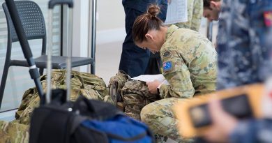 Australian Defence Force medical and scientific personnel from the Army, Air Force and Navy boarded a C-130J Hercules aircraft at Royal Australian Air Force Base Amberley, Queensland, travelling to assist with a recent COVID-19 outbreak at North West Regional Hospital in Burnie, Tasmania. Photo by Trooper Jonathan Goedhart.