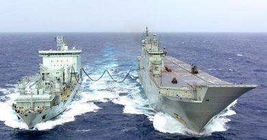 HMAS Adelaide conducts a replenishment-at-sea fuel transfer with Royal Canadian Navy supply ship MV Asterix during the sea phase of Exercise RIMPAC 18. Photo by Able Seaman Ronnie Baltoft.