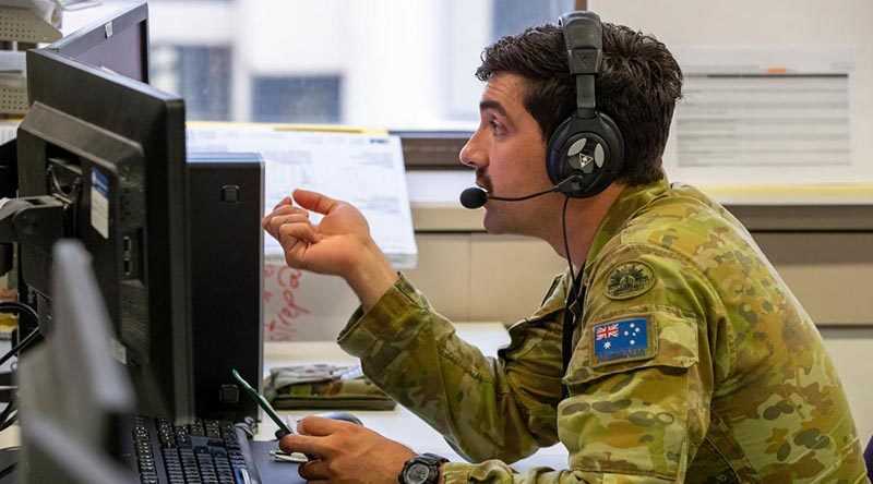 Australian Army soldier Lance Corporal Henry Hudson at the NSW Health COVID-19 Trace Contact Centre. Photo by Corporal Chris Beerens.