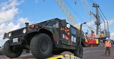 US Marines with Marine Rotation Force - Darwin load a Humvee at East Wharf Port Darwin. US Marine Corps photo by Lance Corporal Natalie Greenwood.